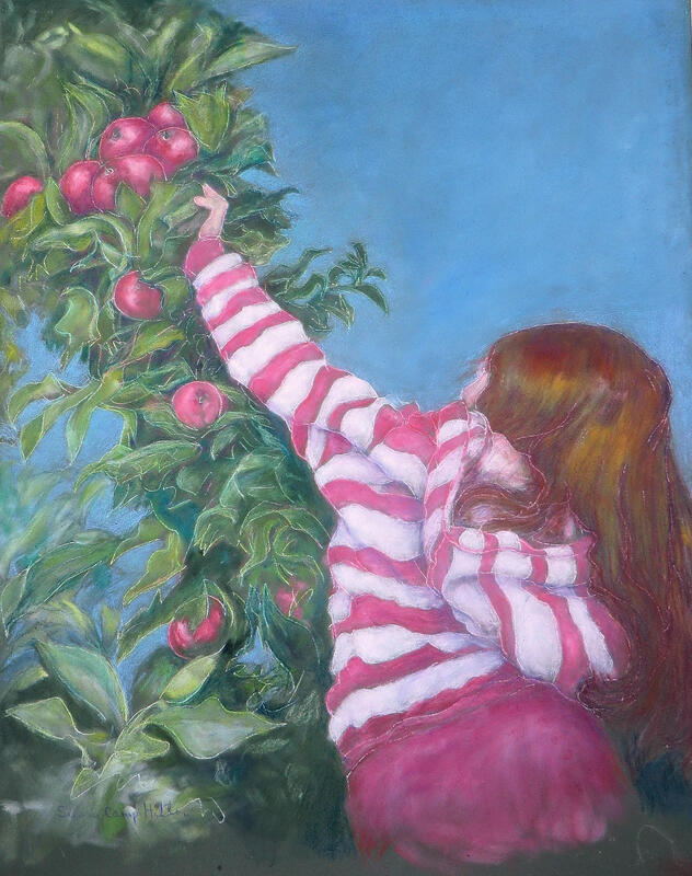 Girl picking apples